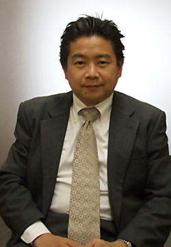 ジュピターテレコムのCIOに相当する岡田壮祐・システム本部長兼システム企画部長