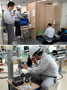 電信電話工事協会が2008年7月29日に開催する「第4回光通信工事技能競技大会」に向け、研修施設で作業ノウハウを磨く日本コムシスの技術者たち